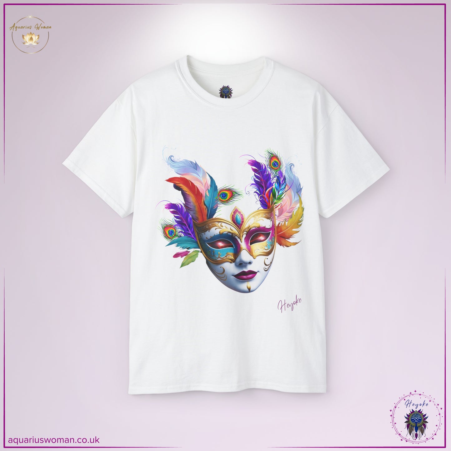 The Cosmic Masquerade Tee in White from the Heyoke Collection features an ornate Venetian-style mask adorned with vibrant peacock and fire-toned feathers. Symbolising transformation, hidden wisdom, and spiritual alchemy, this tee is a bold statement of self-discovery and mysticism.