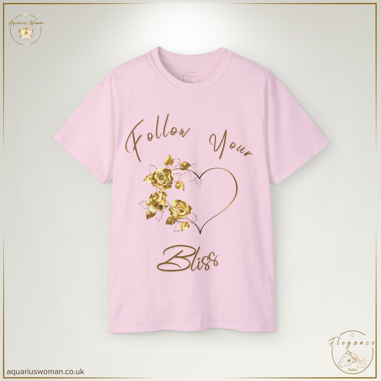 The Follow Your Bliss Tee in Light Pink showcases a refined gold heart and floral embellishments, celebrating elegance and self-discovery. The cursive inscription serves as a daily reminder to embrace what brings happiness and fulfilment.