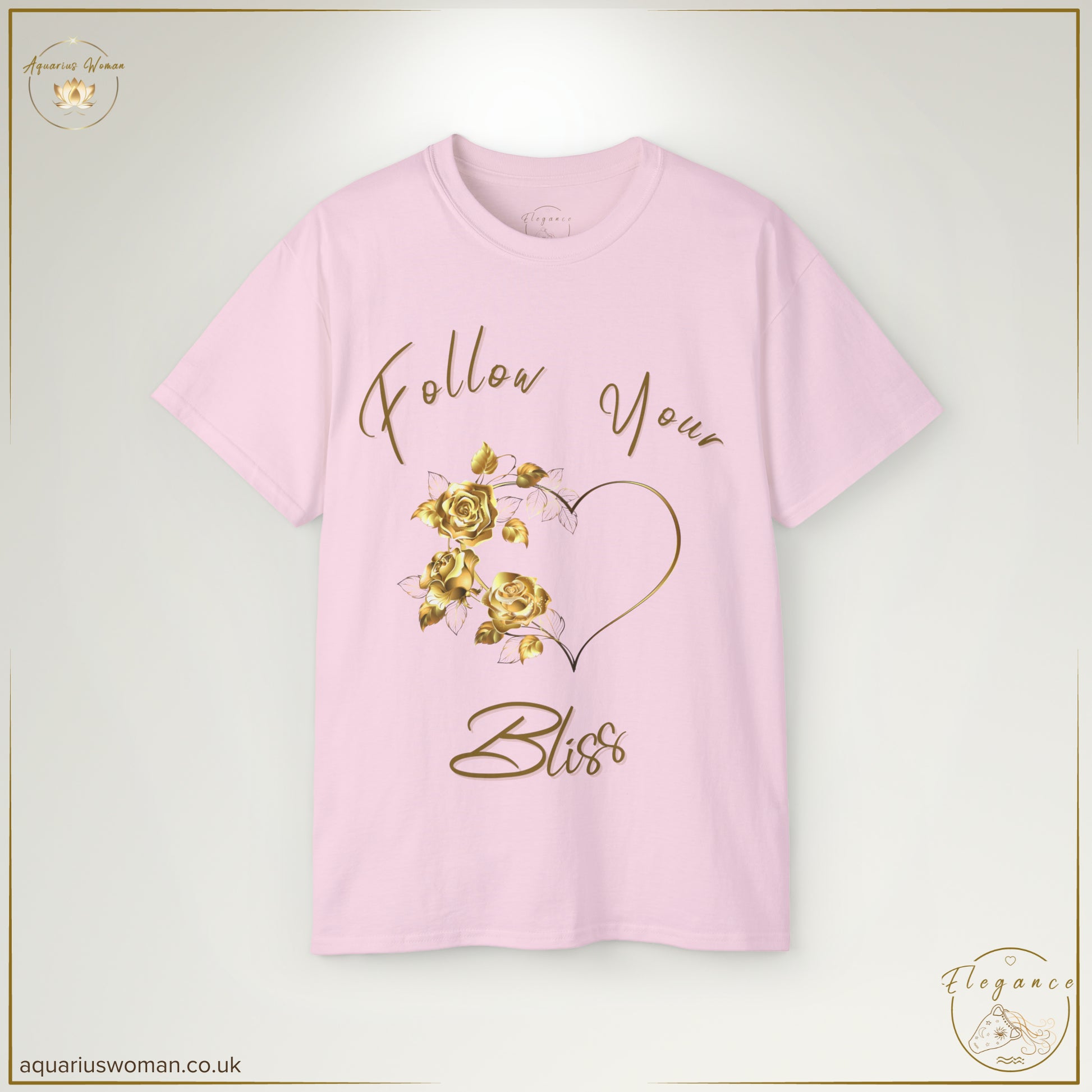 The Follow Your Bliss Tee in Light Pink showcases a refined gold heart and floral embellishments, celebrating elegance and self-discovery. The cursive inscription serves as a daily reminder to embrace what brings happiness and fulfilment.