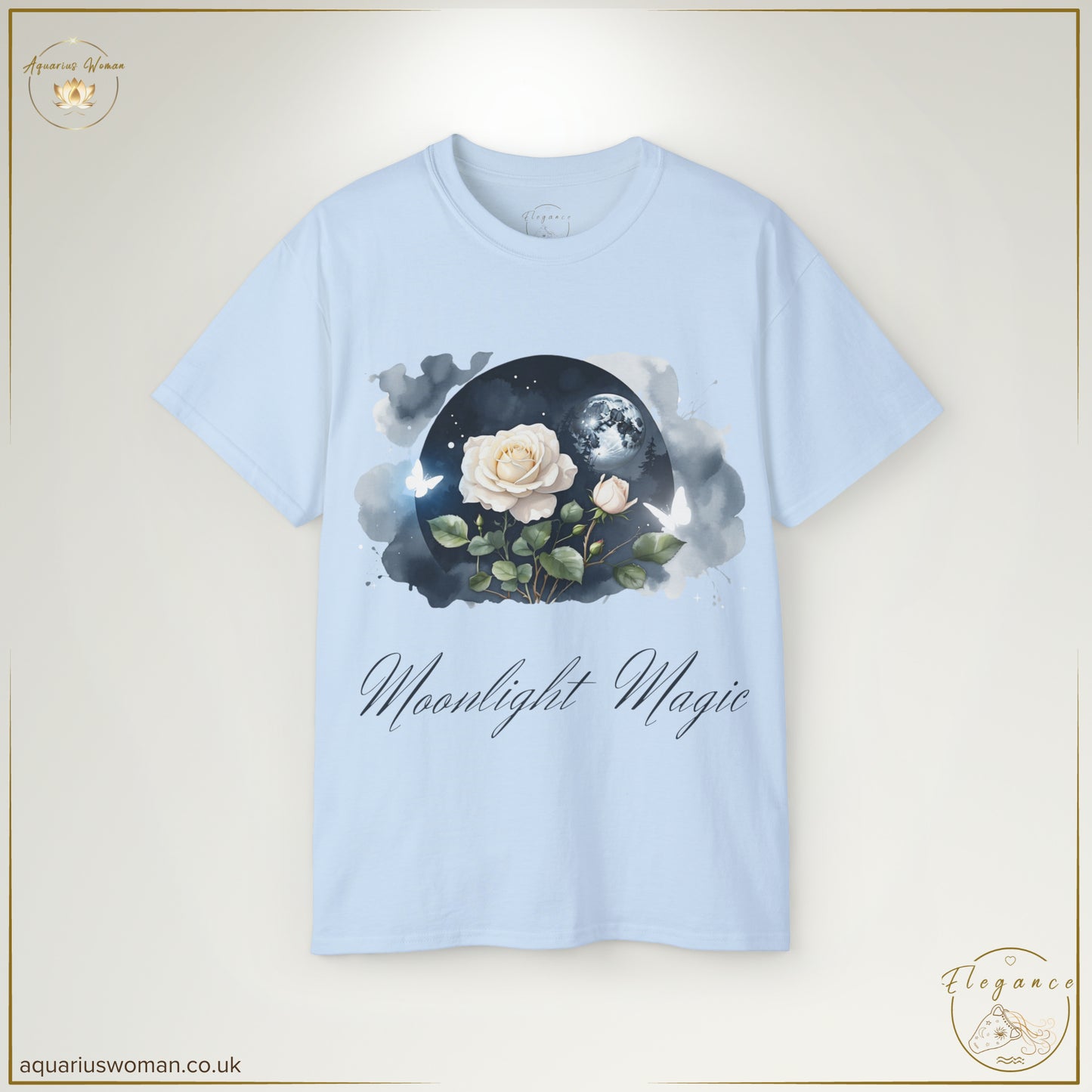 The Moonlight Magic Tee in Light Blue features a dreamy illustration of a white rose illuminated by moonlight, accented with stars and ethereal watercolour tones. A timeless piece embodying grace, intuition, and celestial elegance.
