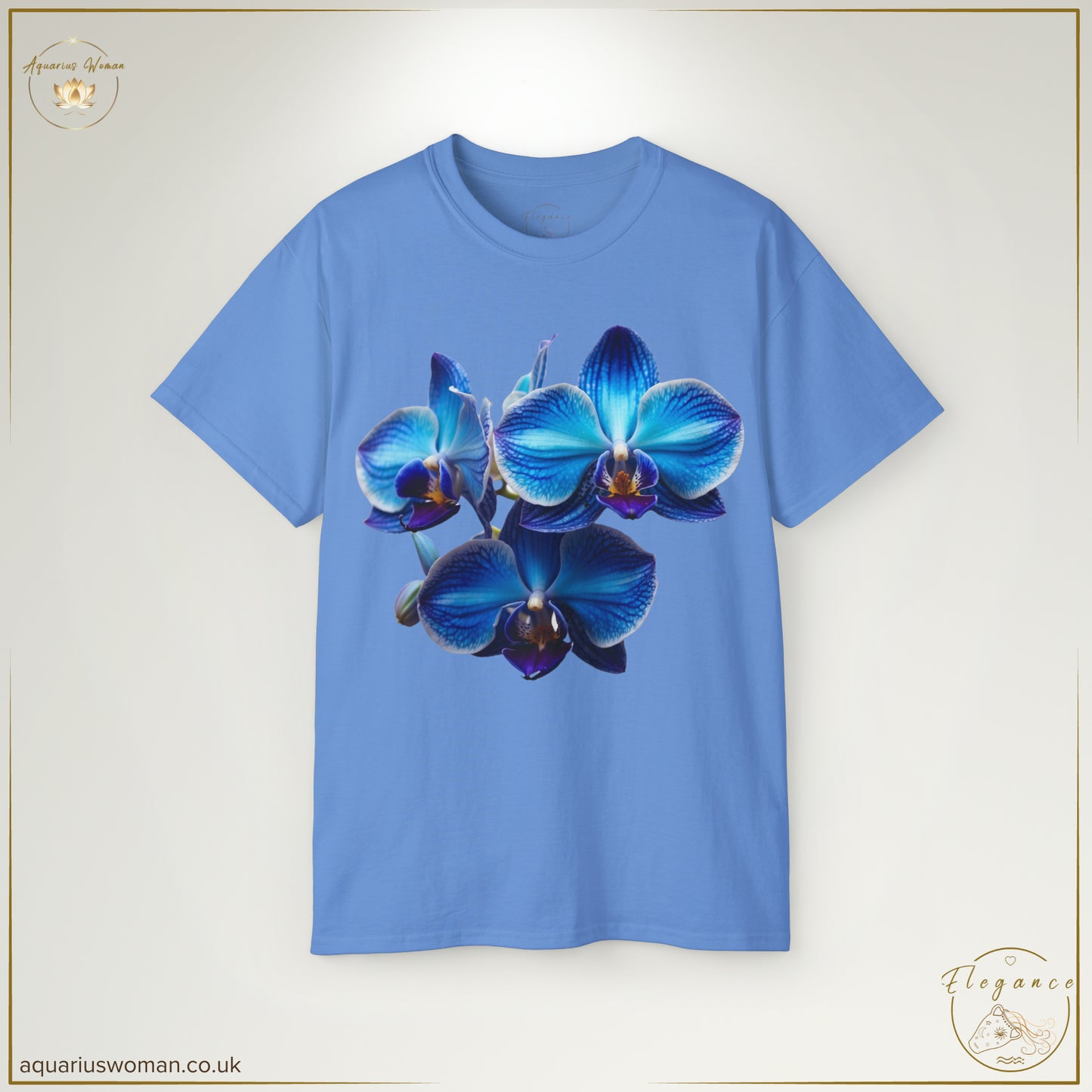 The Orchid Tranquillity Tee in Carolina Blue showcases a vibrant blue orchid, representing inner strength and rare beauty. A sophisticated yet simple statement piece for effortless elegance.