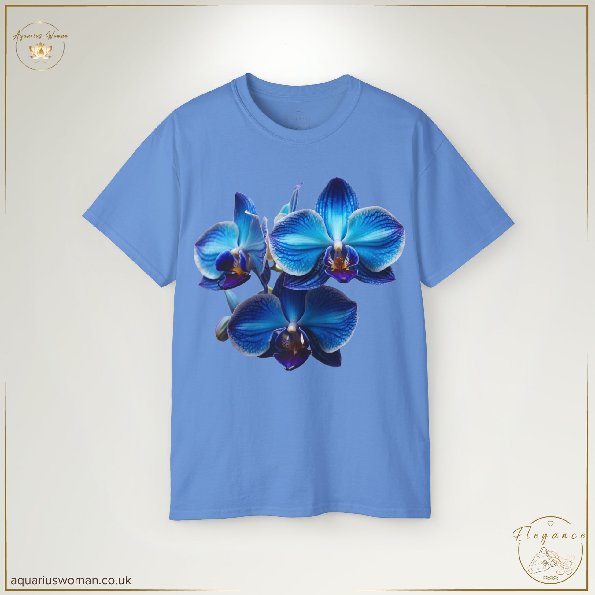 The Orchid Tranquillity Tee in Carolina Blue showcases a vibrant blue orchid, representing inner strength and rare beauty. A sophisticated yet simple statement piece for effortless elegance.