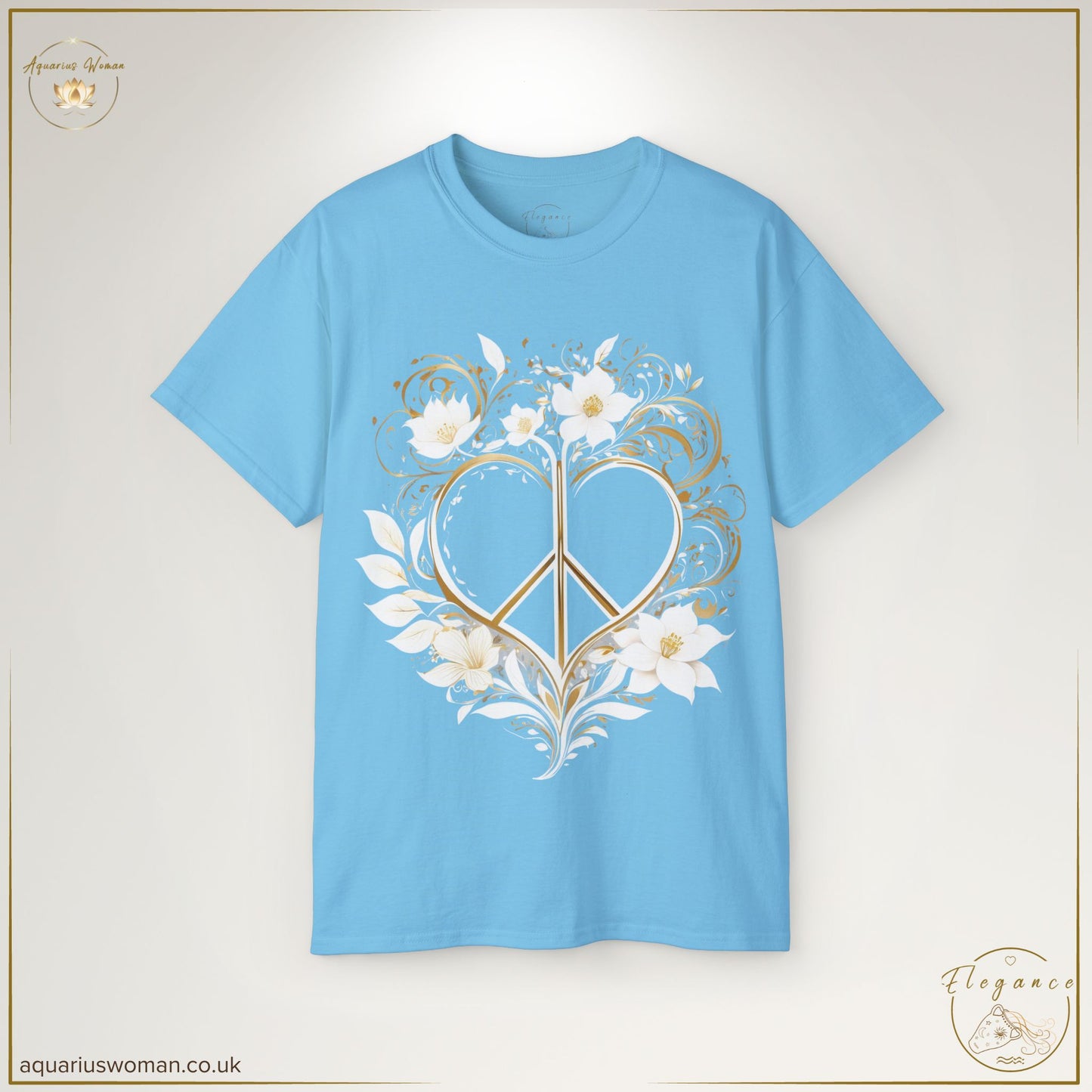 "Peaceful Heart Tee" in Sky Blue from the Elegance Collection by Aquarius Woman. A beautifully designed t-shirt with an elegant gold peace heart, decorated with intricate white flowers and delicate golden swirls, celebrating serenity and mindfulness.