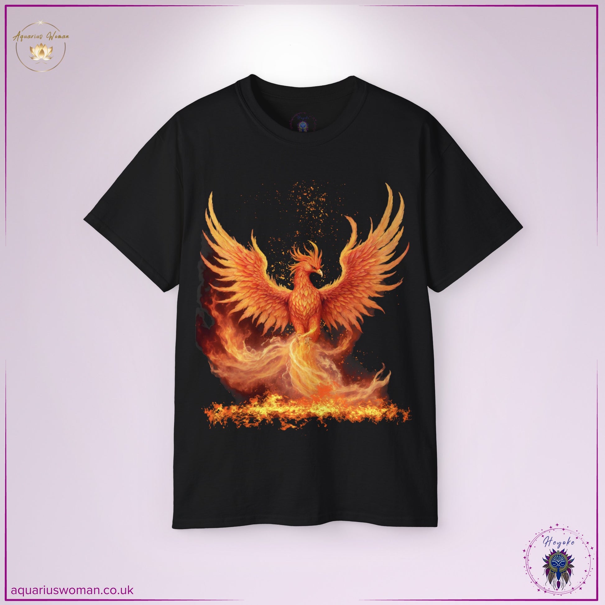 Phoenix Rising Tee in black from the Heyoke Collection. A powerful depiction of a fiery phoenix ascending from the flames, symbolising rebirth, resilience, and transformation. With vivid reds, oranges, and golds, this design represents overcoming adversity and embracing renewal.