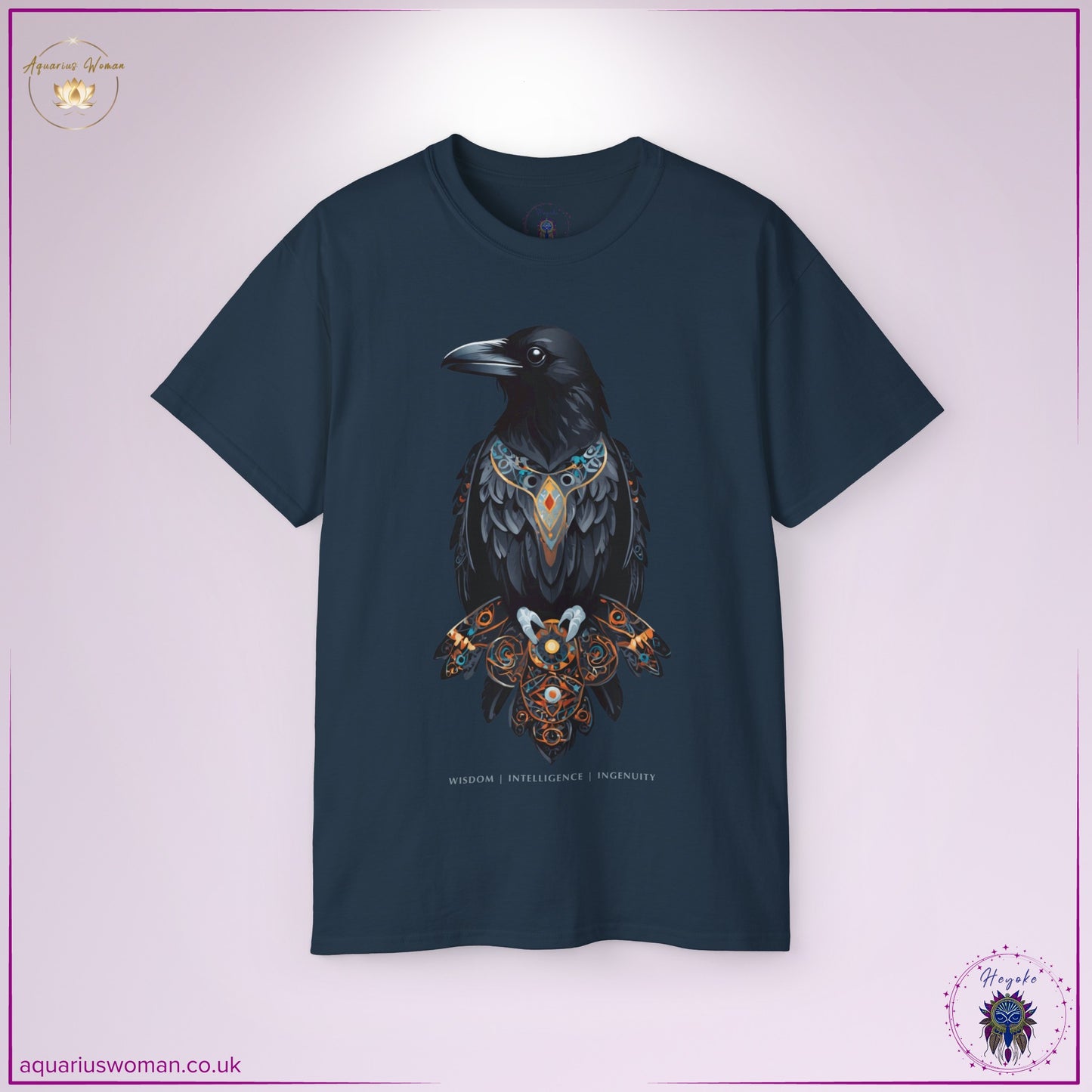 The Raven Spirit Animal Tee in Blue Dusk from the Heyoke Collection. Showcases a majestic raven with detailed sacred patterns, representing intelligence, adaptability, and the mysteries of the unseen. A bold and thought-provoking symbol of wisdom and transformation.