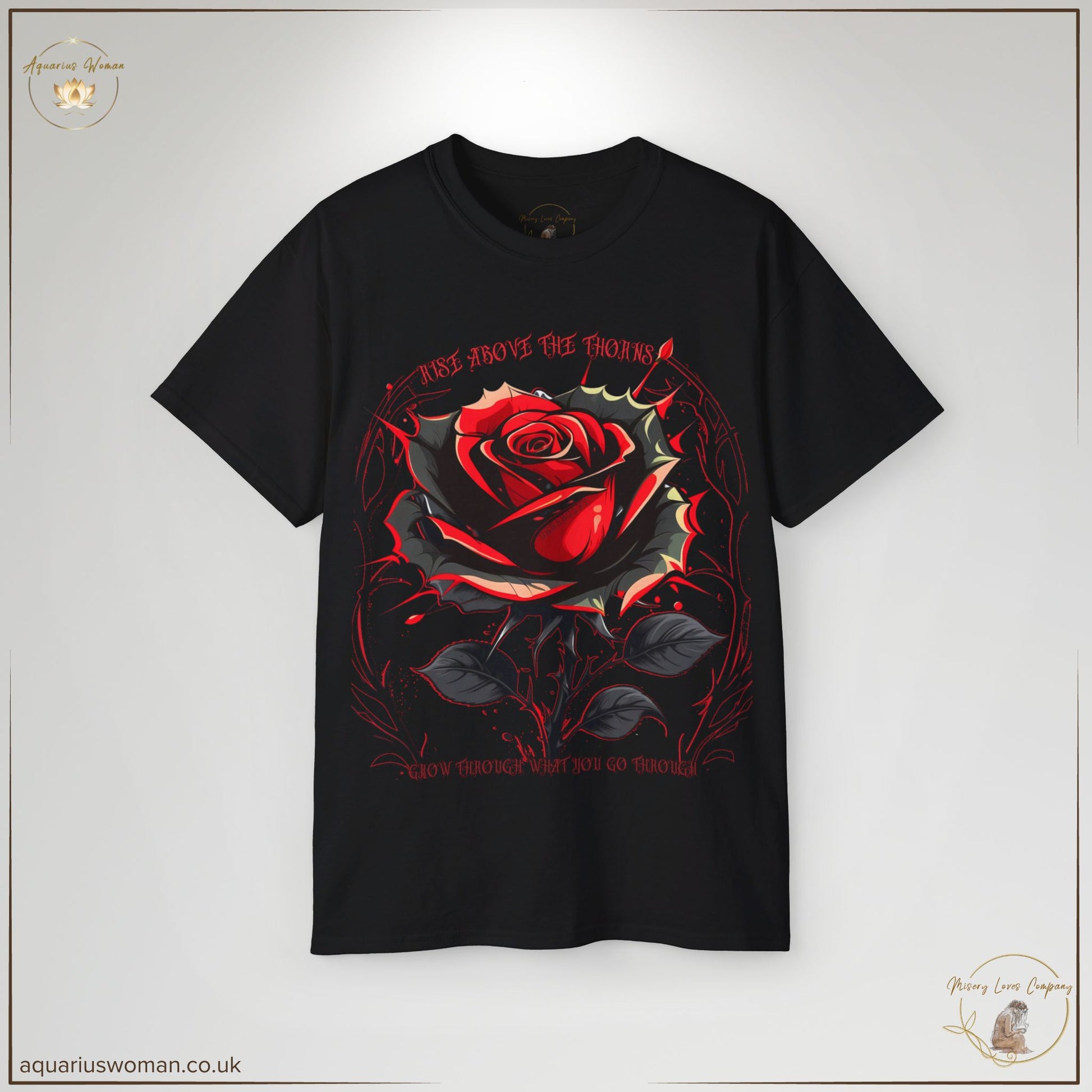 "Rise Above the Thorns" Empowerment Tee in black from the Misery Loves Company Collection. Features a striking red and black rose surrounded by sharp thorns, symbolising resilience and personal growth. The phrases "Rise Above the Thorns" and "Grow Through What You Go Through" reinforce the power of transformation through struggle.