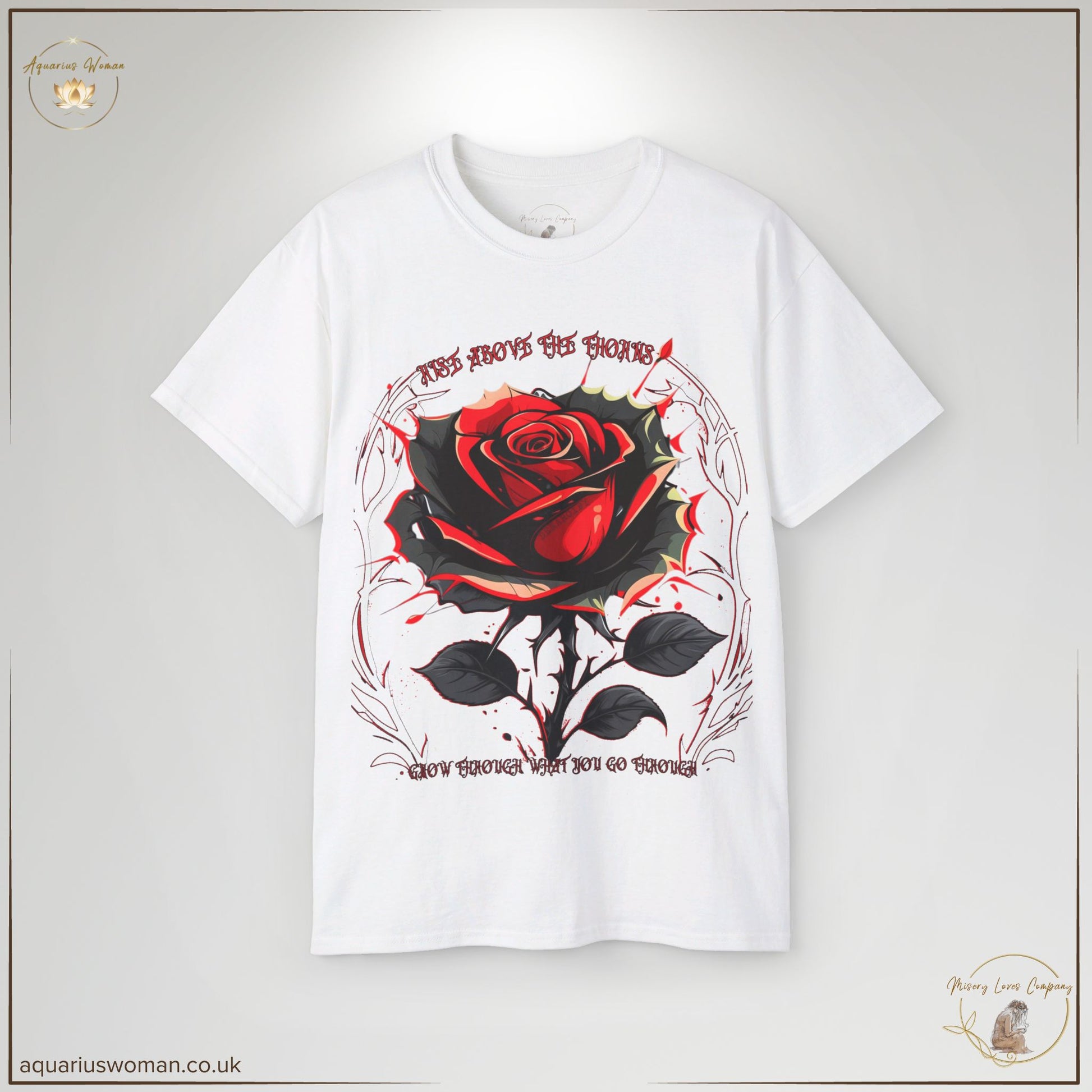 "Rise Above the Thorns" Empowerment Tee in white from the Misery Loves Company Collection. A bold rose and thorn design with deep red and black hues, representing perseverance, survival, and strength. Perfect for those who have overcome adversity and continue to rise.