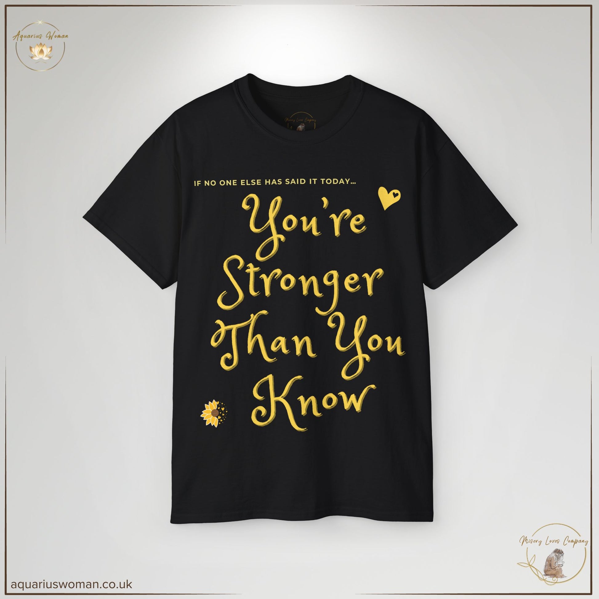 "You’re Stronger Than You Know" Tee in black from the Misery Loves Company Collection by Aquarius Woman. Features an empowering handwritten-style message in gold, offering a daily reminder of resilience and inner strength.