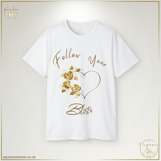 The Follow Your Bliss Tee in White from the Elegance Collection features an elegant gold-toned heart entwined with delicate roses. With graceful cursive lettering, this design symbolises love, growth, and the pursuit of joy.