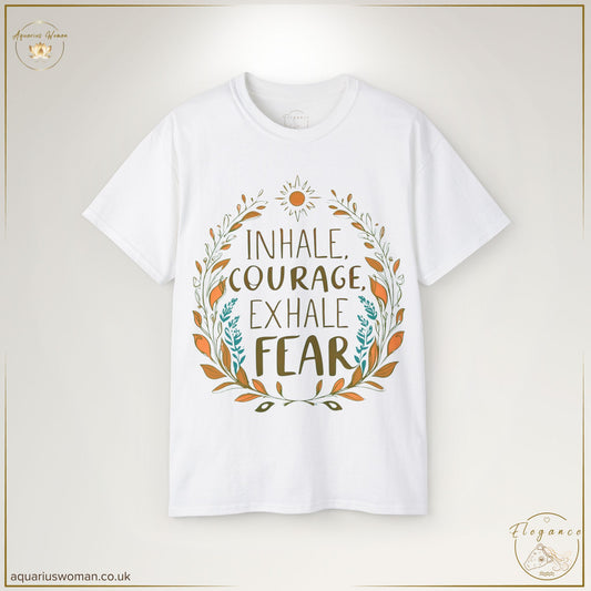 "Inhale Courage, Exhale Fear" Mindful Sun Tee from the Elegance Collection by Aquarius Woman. Features an inspiring mantra framed by delicate floral wreaths and a radiant sun, symbolising personal growth, resilience, and mindfulness. Designed for those embracing courage, positivity, and transformation.