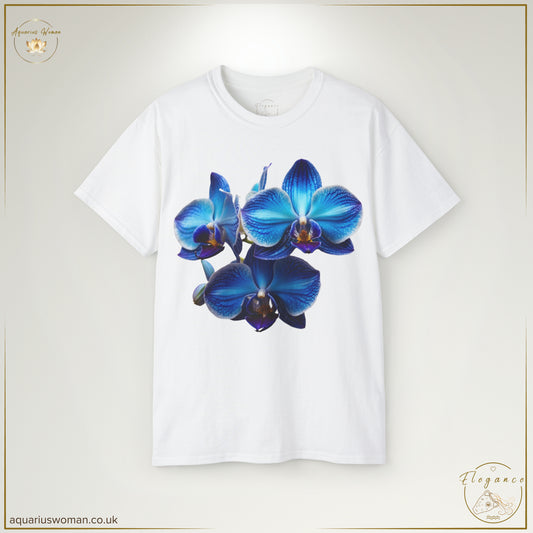 The Orchid Tranquillity Tee in White from the Elegance Collection features a striking blue orchid, symbolising beauty, resilience, and quiet strength. A timeless, minimalist design celebrating transformation and grace.