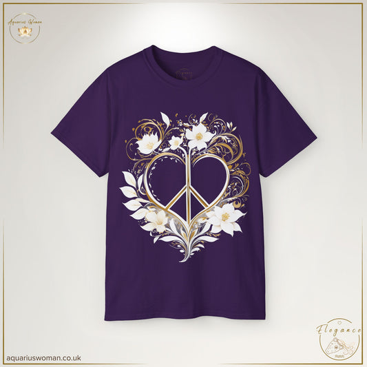 "Peaceful Heart Tee" in Purple from the Elegance Collection by Aquarius Woman. Features a gold heart-shaped peace sign adorned with delicate floral motifs and golden swirls, symbolising mindfulness, harmony, and inner balance.